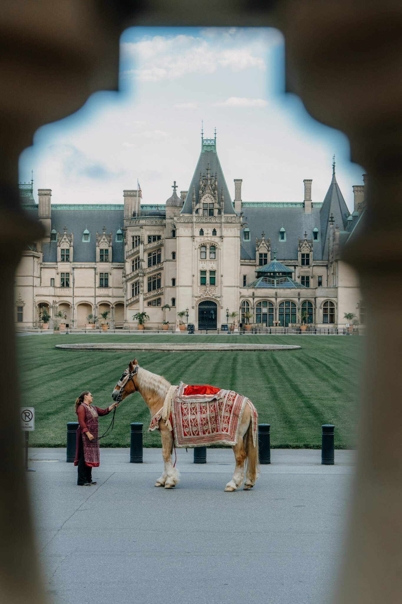 Biltmore House seen through a stone archway