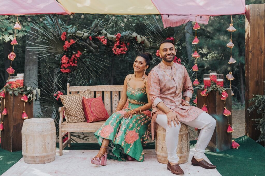 Couple seated together at their Mehendi