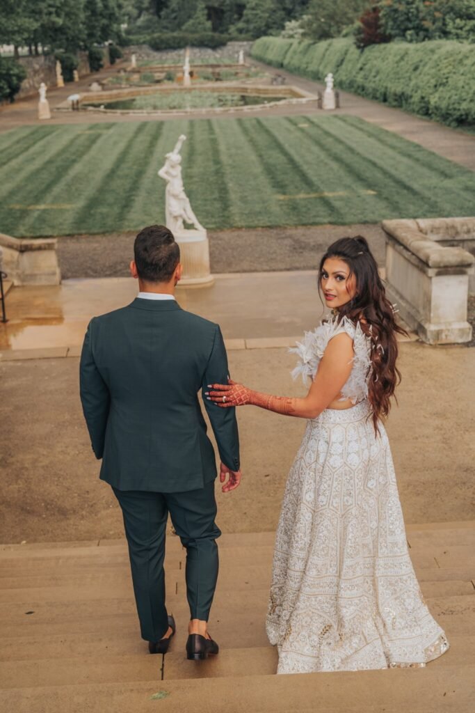 Couple walking across the lawn